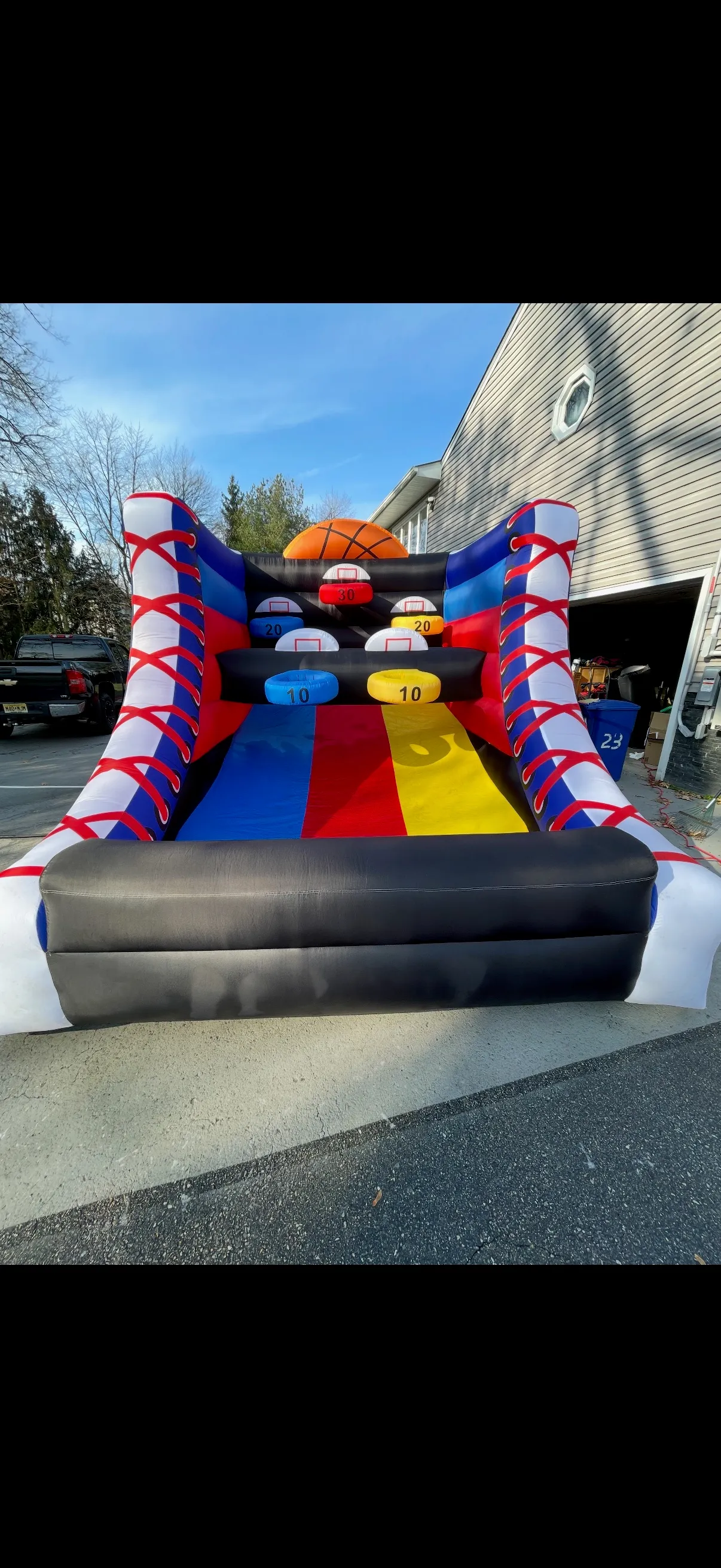 Kids playing inflatable axe throw