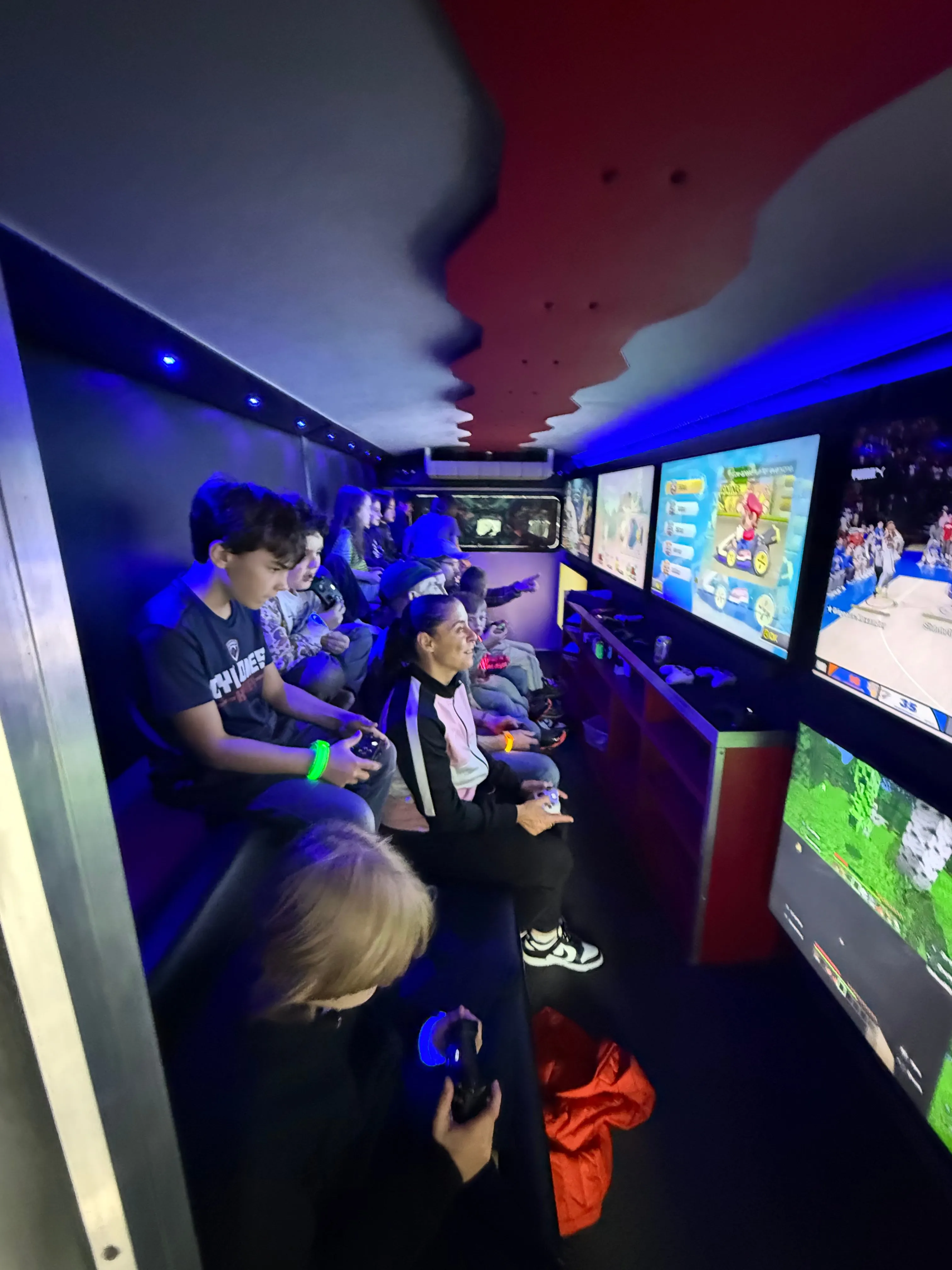 Kids enjoying the gaming truck party